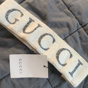 Gucci headband tags still on white and black